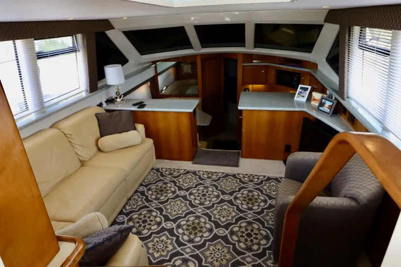 Grace Wins II Yacht Photos Pics Luxurious interior of 2001 Carver 406 Motor Yacht with elegant seating and decor.