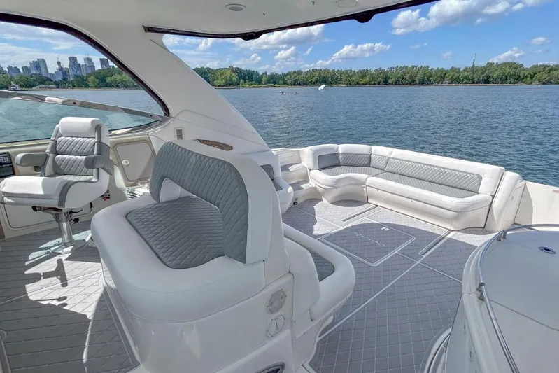  Yacht Photos Pics Luxurious 1998 Sea Ray 540 Sundancer yacht interior with plush seating and scenic water view.