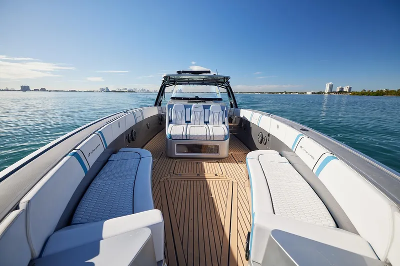  Yacht Photos Pics Open deck of Midnight Express 43' Open boat on calm water, clear sky.