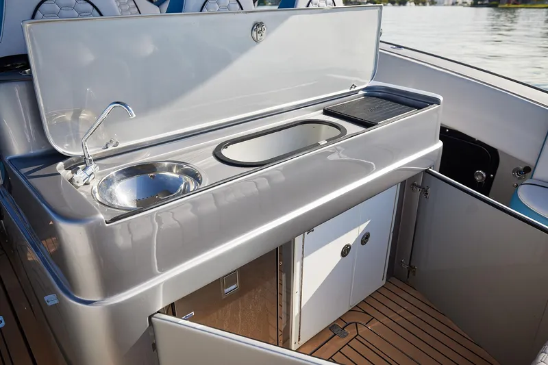  Yacht Photos Pics Luxury boat galley with sink and storage on Midnight Express 43' Open.