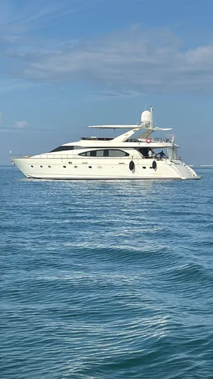  Yacht Photos Pics Luxury 1998 Azimut Ultimate yacht cruising on calm blue waters.