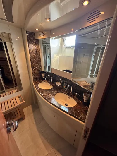  Yacht Photos Pics Luxurious 1998 Azimut Ultimate yacht bathroom with dual sinks and elegant marble countertop.