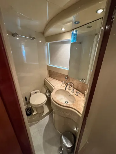  Yacht Photos Pics Luxurious 1998 Azimut Ultimate yacht bathroom with modern fixtures and elegant design.