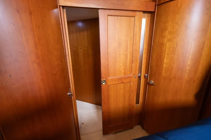 Blue Sapphire Yacht Photos Pics Interior view of 2001 Silverton 410 Sport Bridge with wooden doors and paneling.