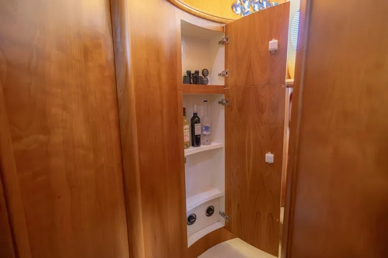 Blue Sapphire Yacht Photos Pics Wooden cabinet interior on a 2001 Silverton 410 Sport Bridge yacht.