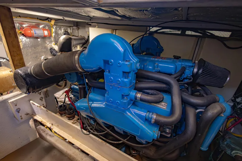 Blue Sapphire Yacht Photos Pics Engine room of 2001 Silverton 410 Sport Bridge with blue marine engine.