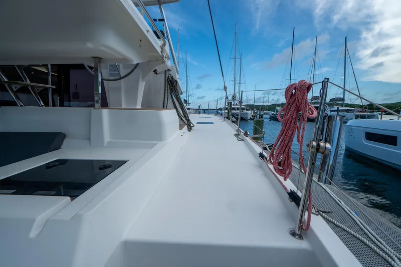 Hourglass Yacht Photos Pics 2020 Fountaine Pajot Saona 47 catamaran deck with marina view.