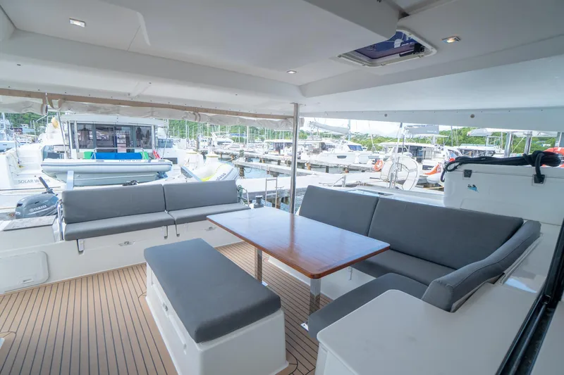 Hourglass Yacht Photos Pics 2020 Fountaine Pajot Saona 47 yacht with spacious outdoor seating and table.