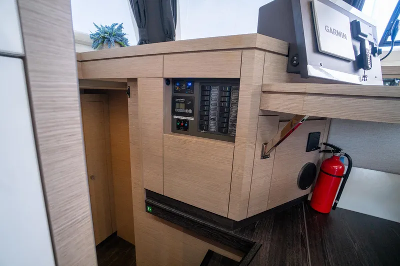 Hourglass Yacht Photos Pics Control panel area on a 2020 Fountaine Pajot Saona 47 catamaran interior.