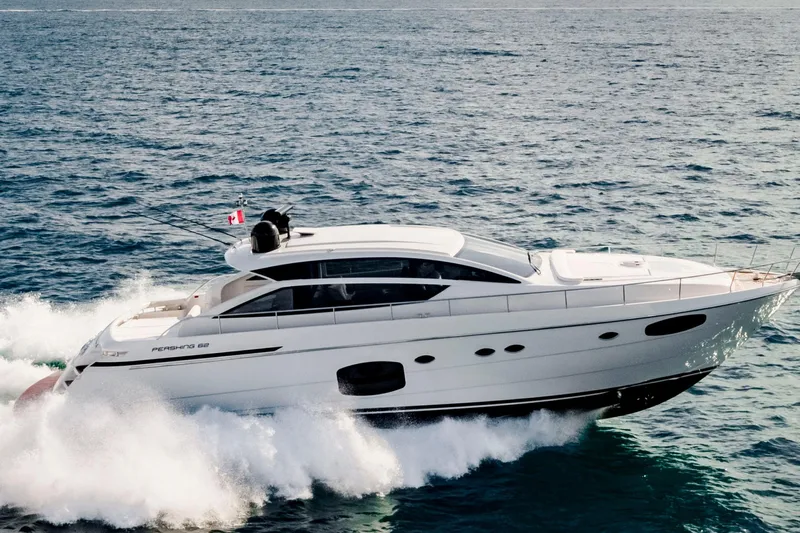 Sea Suite Yacht Photos Pics 2021 Pershing 62 yacht cruising on open sea, showcasing sleek design and powerful performance.