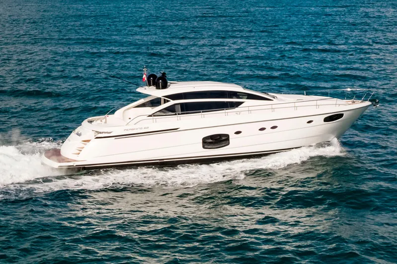 Sea Suite Yacht Photos Pics 2021 Pershing 62 yacht cruising on open water, side view.