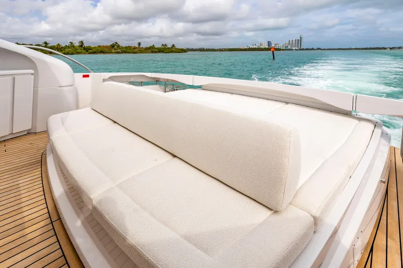 Sea Suite Yacht Photos Pics Luxury seating on 2021 Pershing 62 yacht with ocean view.