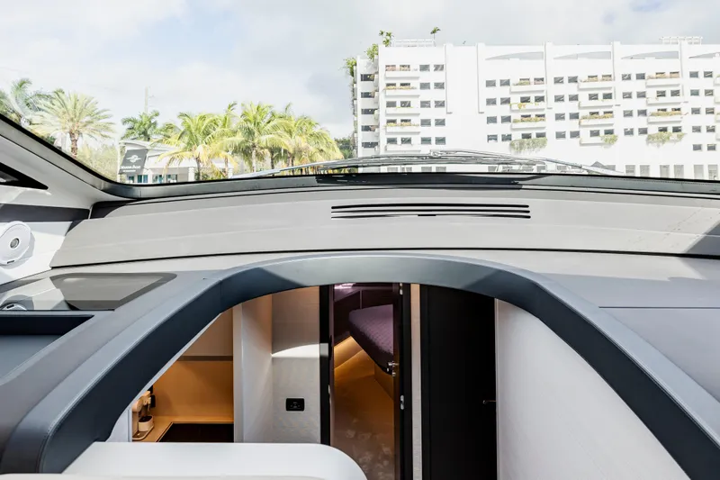 Sea Suite Yacht Photos Pics Interior view of 2021 Pershing 62 yacht with modern design and luxurious cabin.