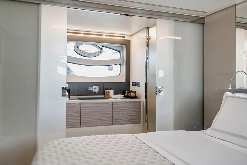Sea Suite Yacht Photos Pics Luxurious interior of 2021 Pershing 62 yacht featuring modern bathroom design.