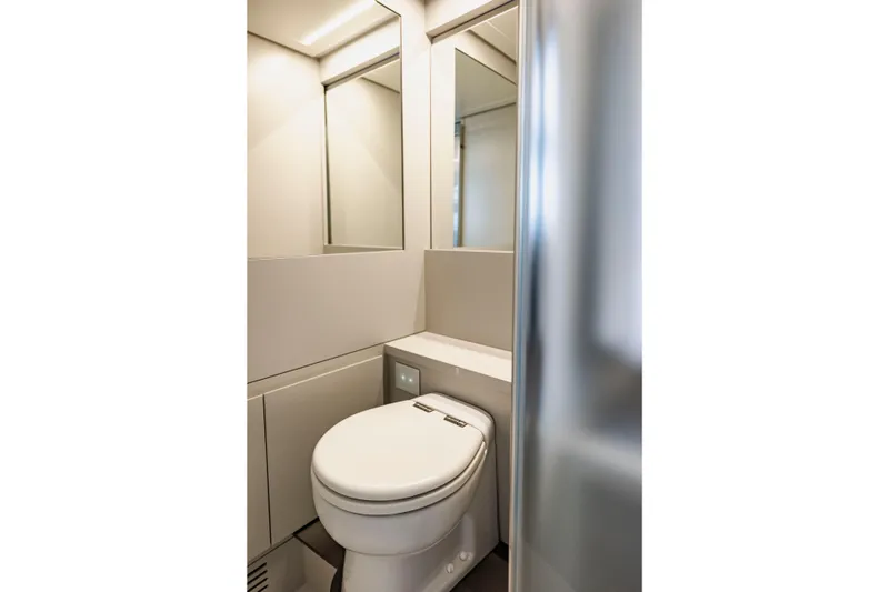 Sea Suite Yacht Photos Pics Modern bathroom interior on 2021 Pershing 62 yacht, featuring sleek design and fixtures.