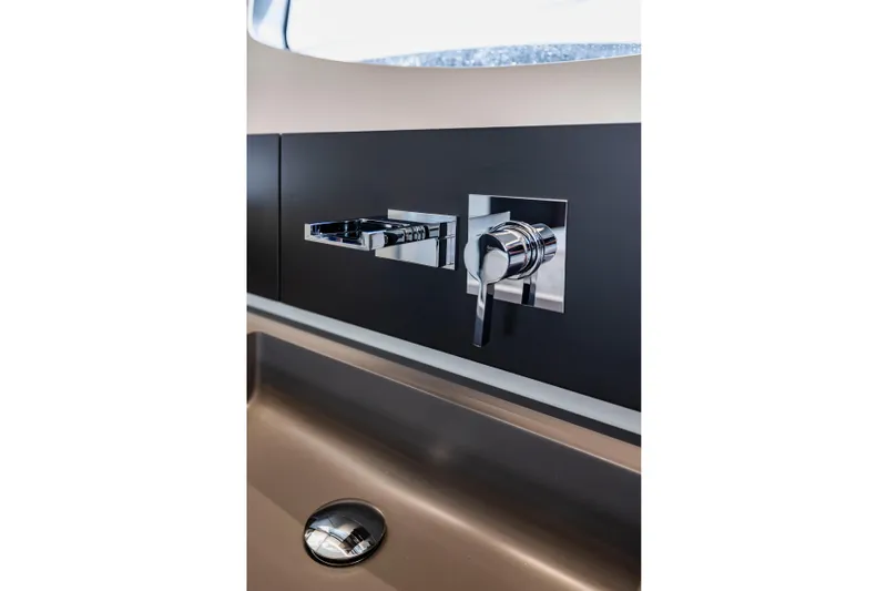 Sea Suite Yacht Photos Pics Modern chrome faucet in 2021 Pershing 62 yacht bathroom.