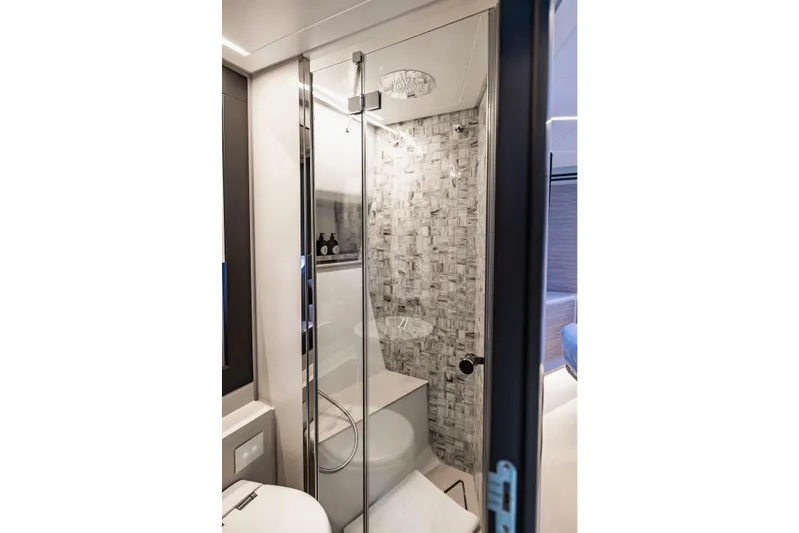 Sea Suite Yacht Photos Pics Luxurious bathroom in 2021 Pershing 62 yacht with modern shower and elegant design.