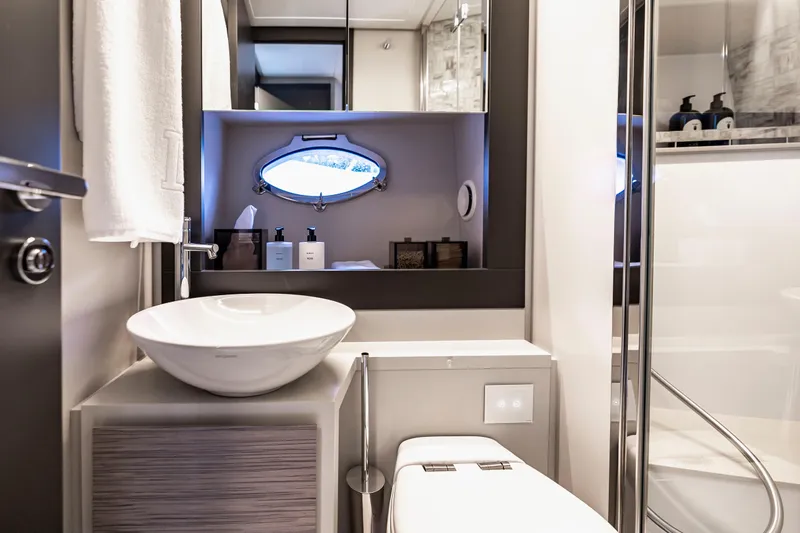 Sea Suite Yacht Photos Pics Luxurious bathroom in 2021 Pershing 62 yacht with modern fixtures and elegant design.