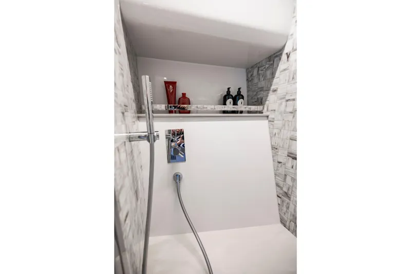 Sea Suite Yacht Photos Pics Luxury shower area in 2021 Pershing 62 yacht with modern fixtures and toiletries.