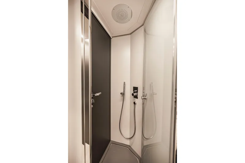 Sea Suite Yacht Photos Pics Modern shower in 2021 Pershing 62 yacht, featuring sleek design and chrome fixtures.