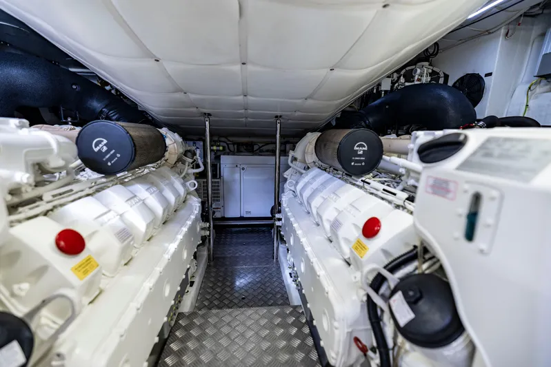 Sea Suite Yacht Photos Pics Engine room of a 2021 Pershing 62 yacht, featuring advanced machinery and equipment.