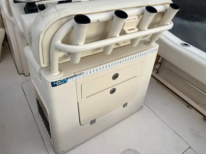  Yacht Photos Pics 2022 Grady-White Fisherman 257 boat console with rod holders and storage compartments.