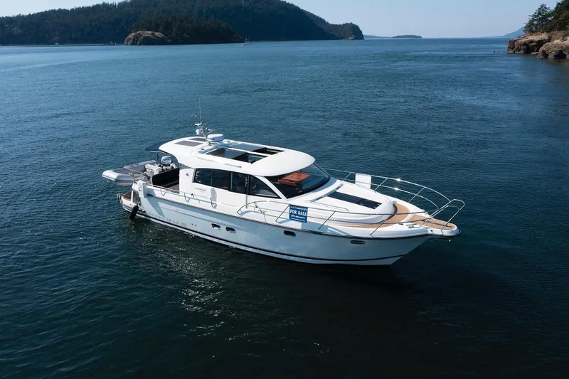  Yacht Photos Pics Nimbus 405 Coupé #88 yacht cruising on serene waters, 2021 model.