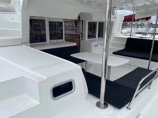 Freebird Yacht Photos Pics Spacious deck area of 2018 Lagoon 450 F catamaran with seating and table.