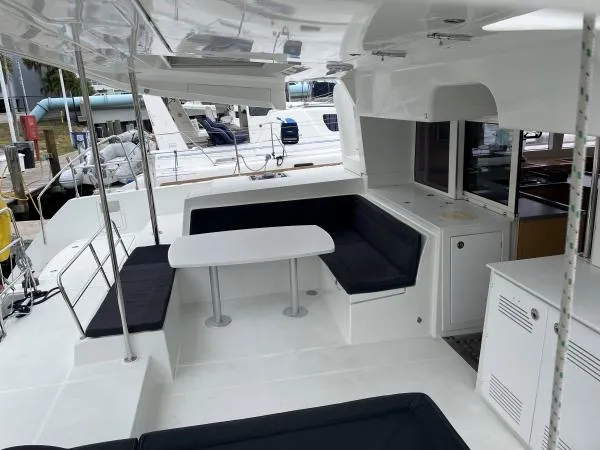 Freebird Yacht Photos Pics Spacious 2018 Lagoon 450 F yacht cockpit with seating and dining area.
