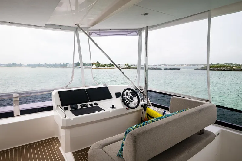Lollypop Yacht Photos Pics Helm of 2022 Leopard 53 Powercat with panoramic ocean view.