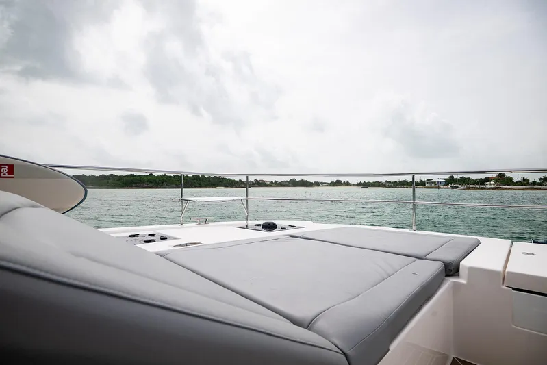Lollypop Yacht Photos Pics 2022 Leopard 53 Powercat deck with ocean view and overcast sky.