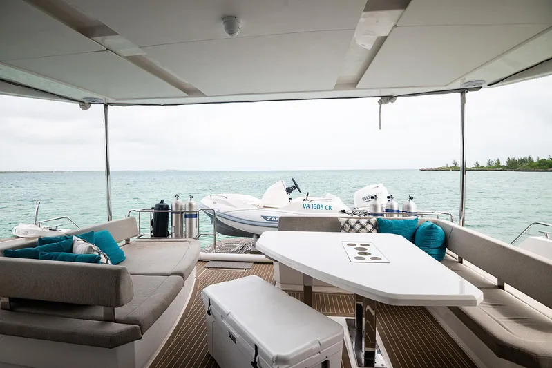 Lollypop Yacht Photos Pics Leopard 53 Powercat 2022 yacht interior with ocean view and seating area.