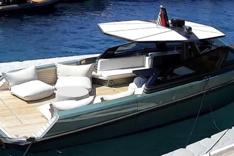 Yacht Photos Pics 2025 Wally Tender 43 luxury yacht docked, featuring sleek design and comfortable seating.