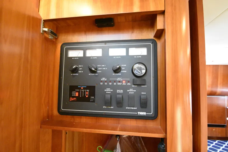 Current Situation Yacht Photos Pics Electrical control panel on 2001 Tiara Yachts 52 Sport Yacht, featuring various gauges and switches.