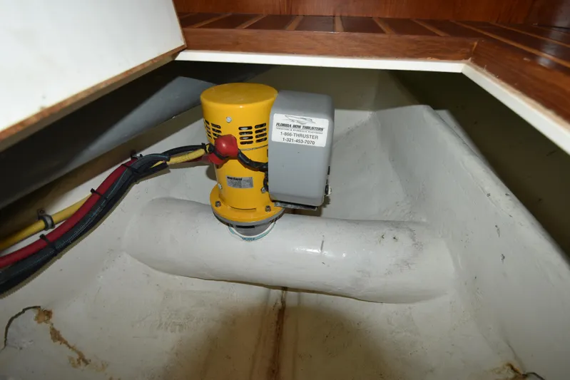 Current Situation Yacht Photos Pics Bow thruster in 2001 Tiara Yachts 52 Sport Yacht, featuring wiring and wooden flooring.