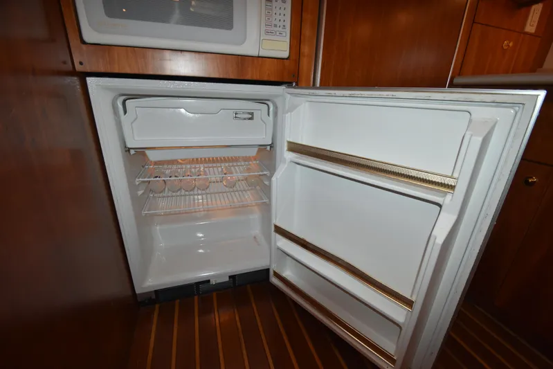 Current Situation Yacht Photos Pics Open refrigerator in 2001 Tiara Yachts 52 Sport Yacht kitchen interior.