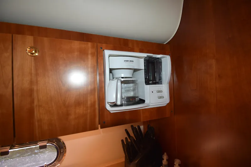 Current Situation Yacht Photos Pics Built-in coffee maker in the 2001 Tiara Yachts 52 Sport Yacht kitchen.