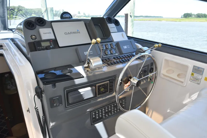 Current Situation Yacht Photos Pics Helm of 2001 Tiara Yachts 52 Sport Yacht with Garmin navigation system.