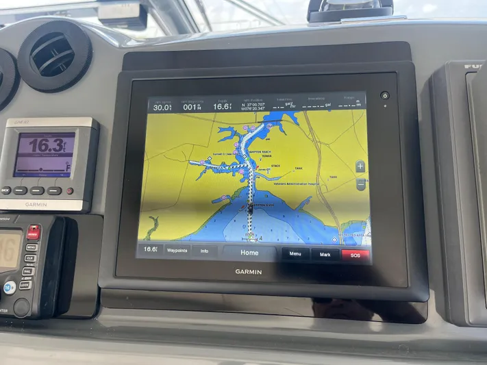 Current Situation Yacht Photos Pics Garmin navigation system on 2001 Tiara Yachts 52 Sport Yacht dashboard.