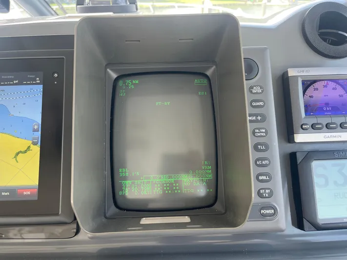 Current Situation Yacht Photos Pics Control panel of a 2001 Tiara Yachts 52 Sport Yacht with navigation displays.