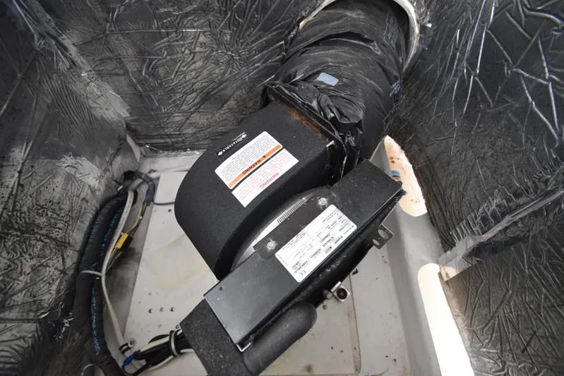 Current Situation Yacht Photos Pics Engine compartment of 2001 Tiara Yachts 52 Sport Yacht with visible components and wiring.