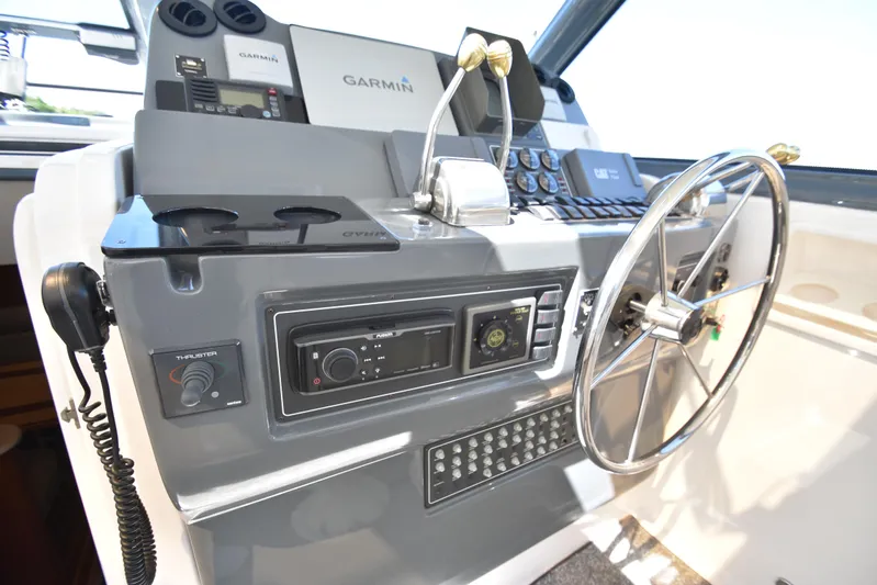 Current Situation Yacht Photos Pics Control panel of a 2001 Tiara Yachts 52 Sport Yacht with Garmin navigation.