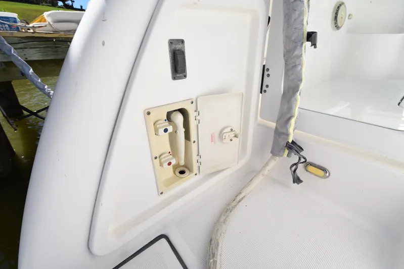 Current Situation Yacht Photos Pics 2001 Tiara Yachts 52 Sport Yacht water hookup and hose storage area.