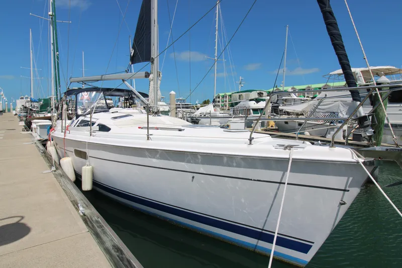 Medicinal Yacht Photos Pics 2002 Hunter 410 sailboat docked at marina under clear blue sky.