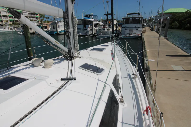 Medicinal Yacht Photos Pics Sailboat docked at marina, Hunter 410 model, 2002, with clear blue sky.