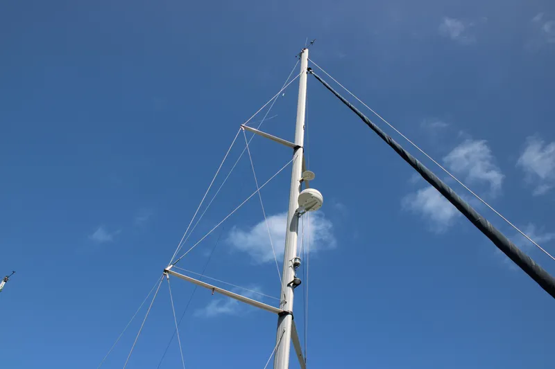 Medicinal Yacht Photos Pics Sailboat mast against blue sky, Hunter 410, 2002 model.