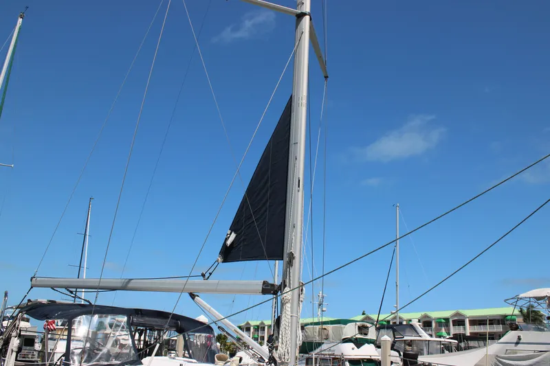 Medicinal Yacht Photos Pics Sailboat Hunter 410, 2002 model, docked under clear blue sky.