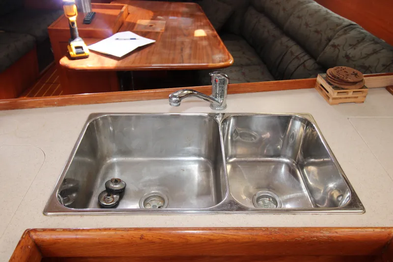 Medicinal Yacht Photos Pics Stainless steel sink in 2002 Hunter 410 yacht kitchen area.