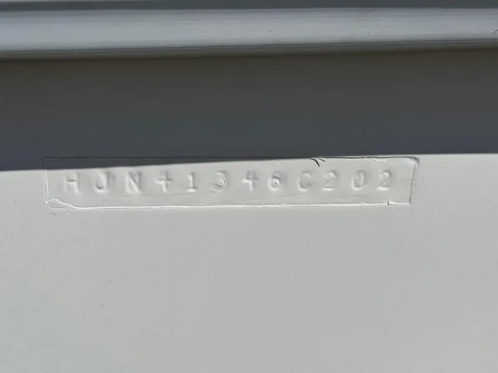 Medicinal Yacht Photos Pics Embossed serial number "HUN41346C202" on Hunter 410, 2002 model.