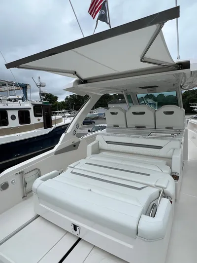  Yacht Photos Pics 2026 Tiara Yachts 34 LS luxury boat with spacious seating and sleek design.